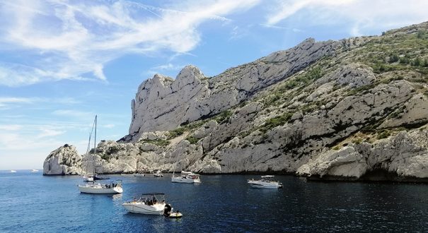Massif des Calanques surrounded by the sea under the sunlight and a blue sky in France