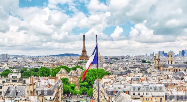 PARIS, FRANCE - JULY 08, 2016 : Beautiful panoramic view of Paris from the roof of the Pantheon. View of the Eiffel Tower and flag of France.